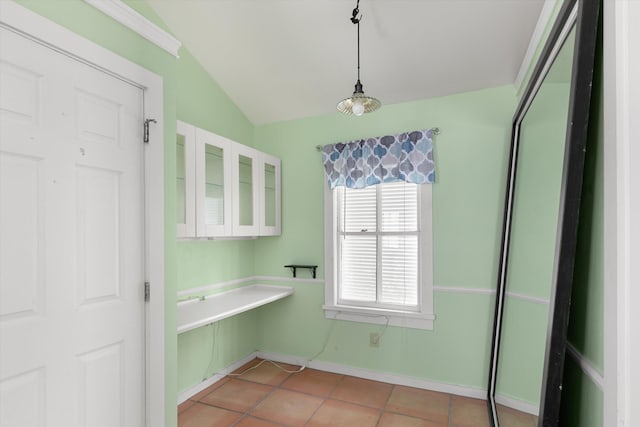 1500 Seminary St Unit 5A, Key West, FL 33040 - bathroom featuring lofted ceiling, tile patterned floors, and baseboards