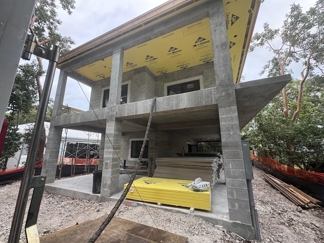 rear view of house with a patio area