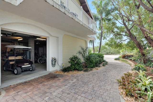 view of side of property with a garage