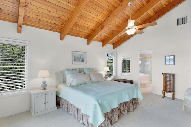 bedroom featuring ensuite bathroom, light colored carpet, wooden ceiling, ceiling fan, and beam ceiling