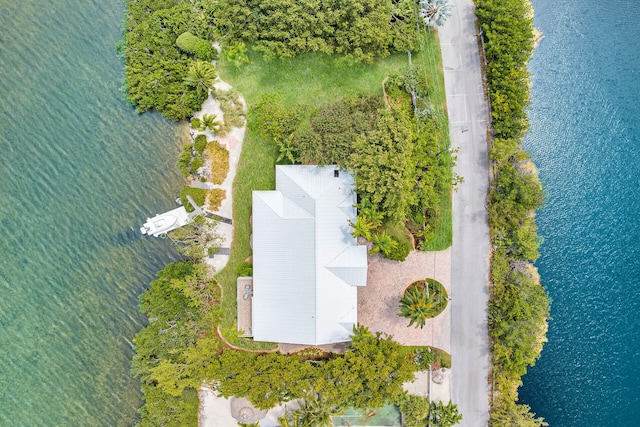 birds eye view of property featuring a water view