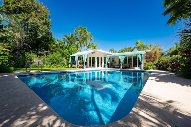 1514 19th St, Key West, FL 33040 - view of pool featuring french doors, an outdoor structure, and a patio