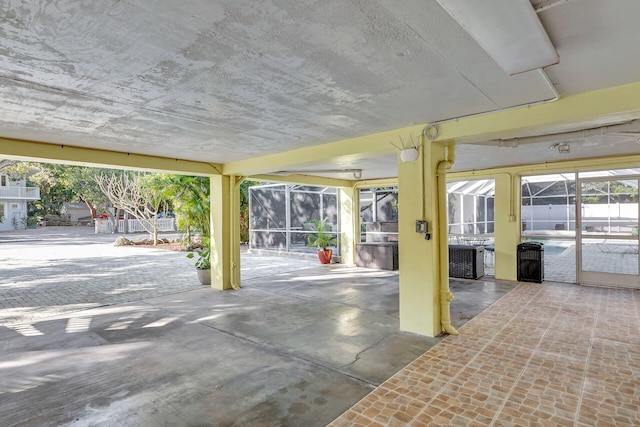 view of patio / terrace with glass enclosure