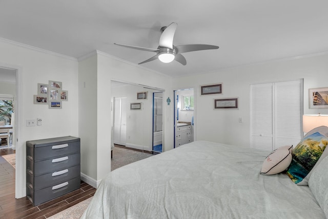 bedroom featuring ornamental molding, a closet, and ceiling fan