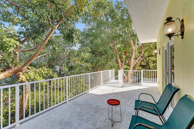 view of patio with a balcony