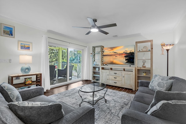 living room featuring ornamental molding, dark hardwood / wood-style floors, and ceiling fan