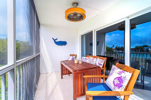 95 Coco Plum Dr Unit 4C, Marathon, FL 33050 - sunroom featuring tile patterned floors