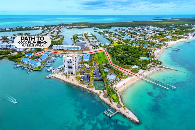 95 Coco Plum Dr Unit 4C, Marathon, FL 33050 - aerial view with a water view and a view of the beach