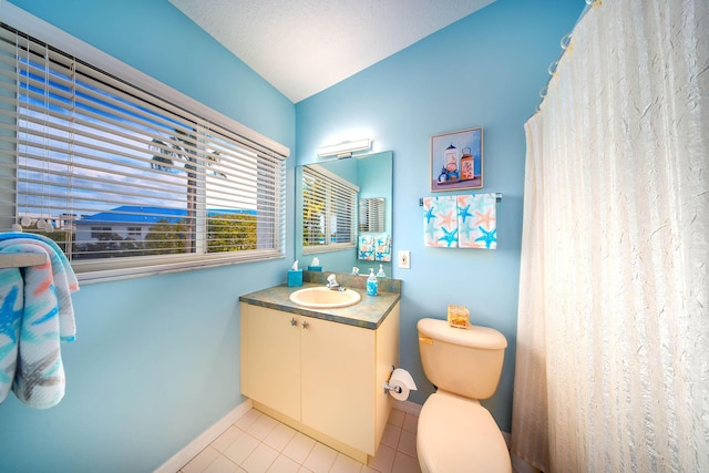 95 Coco Plum Dr Unit 4C, Marathon, FL 33050 - bathroom with toilet, tile patterned flooring, baseboards, and vanity