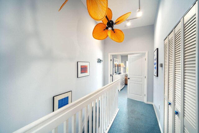 95 Coco Plum Dr Unit 4C, Marathon, FL 33050 - hallway with an upstairs landing and baseboards