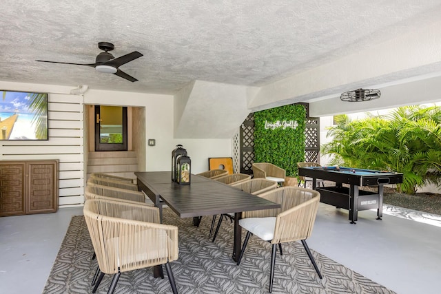 view of patio featuring ceiling fan