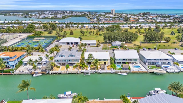 bird's eye view with a water view and a residential view