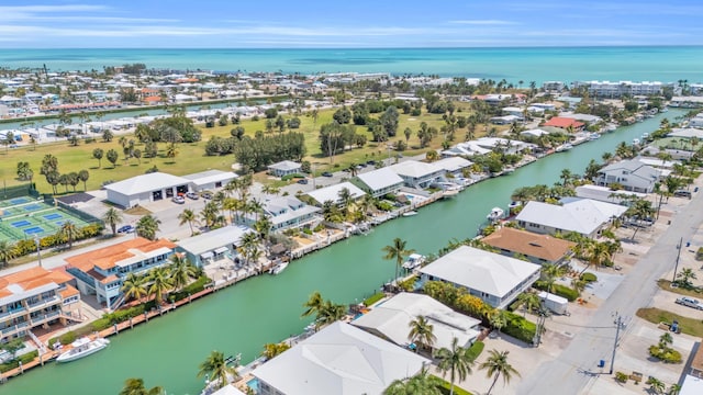 aerial view with a water view and a residential view