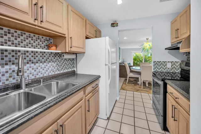 40 High Point Rd Unit C105, Tavernier, FL 33070 - kitchen with stainless steel range with electric stovetop, a sink, under cabinet range hood, dark countertops, and open shelves