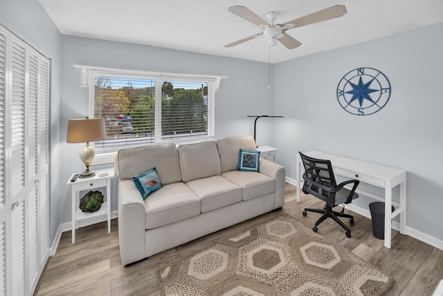 40 High Point Rd Unit C105, Tavernier, FL 33070 - office space with wood finished floors, a ceiling fan, a textured ceiling, and baseboards
