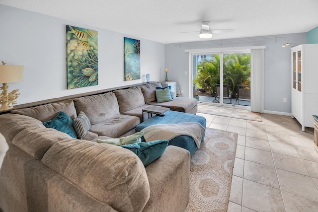 40 High Point Rd Unit C105, Tavernier, FL 33070 - living room featuring light tile patterned floors and ceiling fan