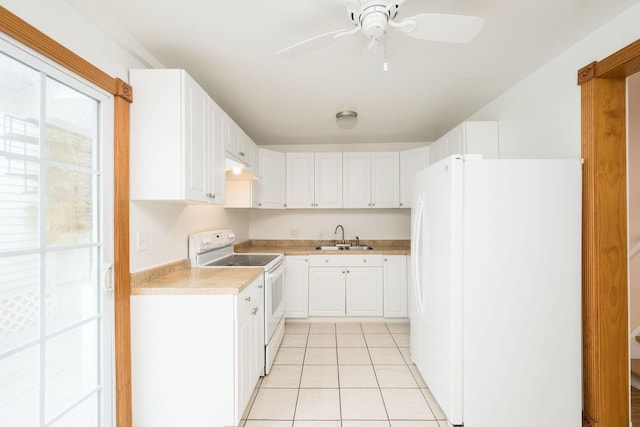 kitchen featuring a sink, light countertops, white cabinets, and white appliances