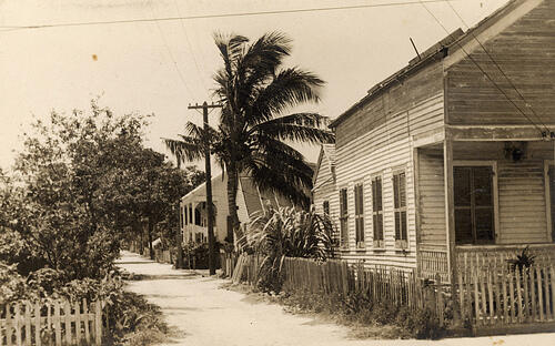 view of side of home with fence
