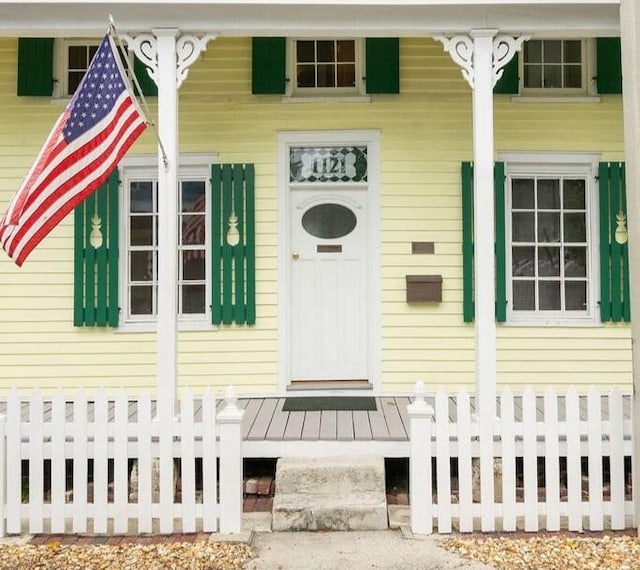 property entrance with a porch
