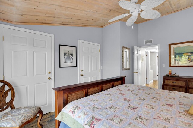 bedroom featuring vaulted ceiling, wood-type flooring, ceiling fan, and wood ceiling