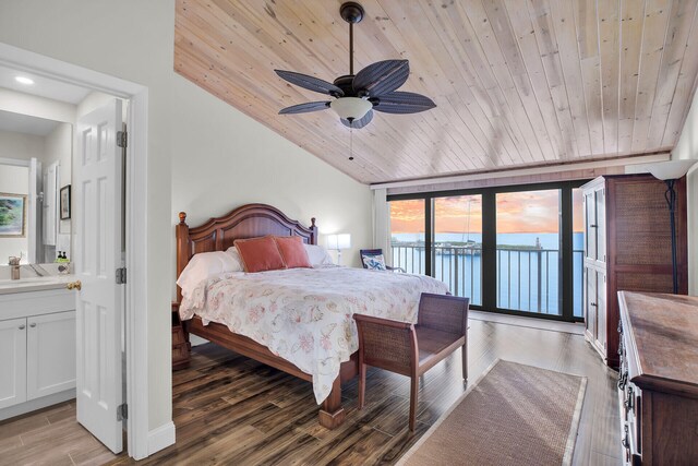 bedroom featuring wood ceiling, vaulted ceiling, connected bathroom, wood finished floors, and access to outside