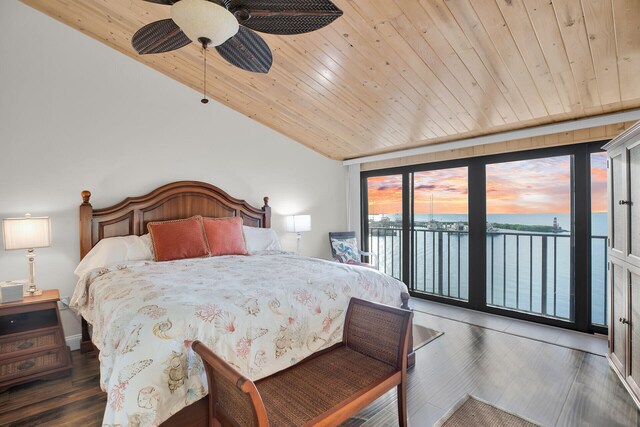 bedroom with vaulted ceiling, dark hardwood / wood-style floors, access to outside, a water view, and wooden ceiling