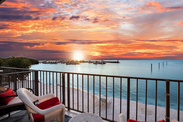 balcony at dusk with a water view