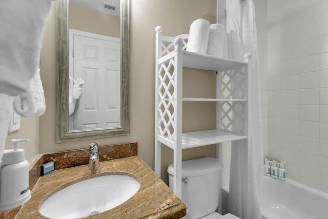 full bath with toilet, vanity, shower / bath combination with curtain, and visible vents