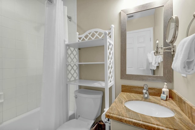 bathroom with shower / bath combo, visible vents, vanity, and toilet