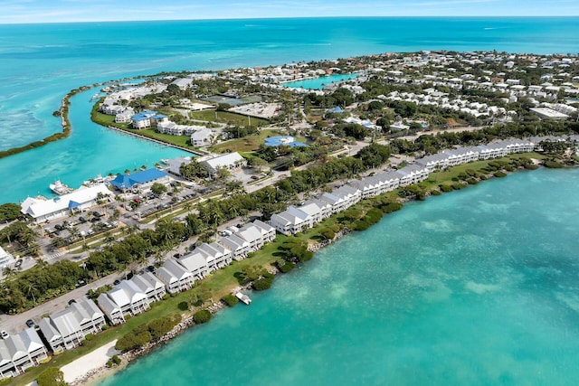 bird's eye view featuring a residential view and a water view