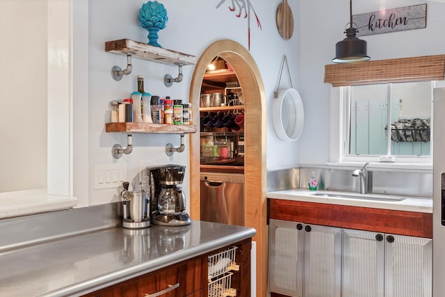 626 Margaret St, Key West, FL 33040 - bar with stainless steel counters, sink, and pendant lighting