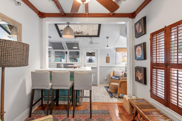 626 Margaret St, Key West, FL 33040 - dining space with ceiling fan, beam ceiling, and light hardwood / wood-style flooring