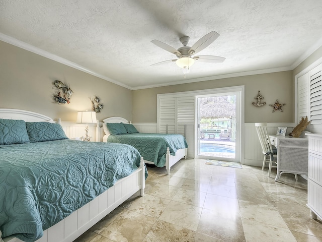 bedroom featuring crown molding, ceiling fan, a textured ceiling, and access to outside