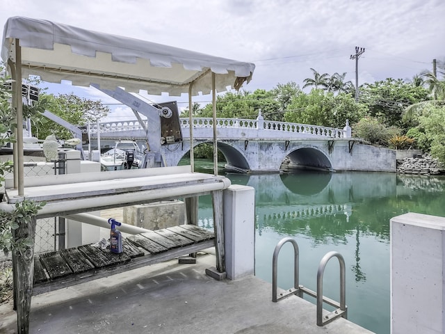 dock area featuring a water view