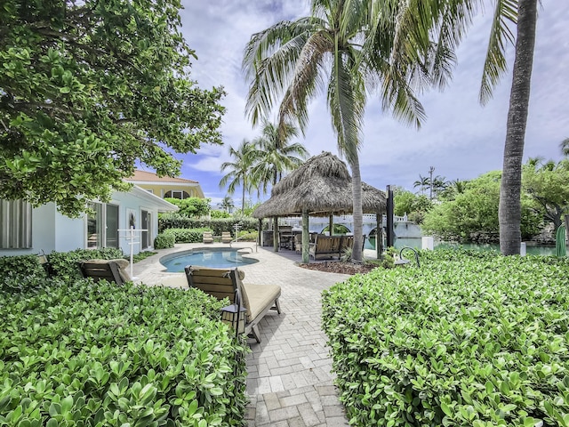 view of swimming pool with a gazebo