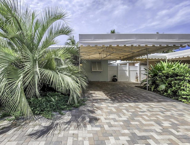 view of patio / terrace featuring a carport