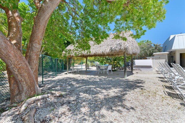 2000 Coco Plum Dr Unit 106, Marathon, FL 33050 - view of yard with a gazebo and a patio