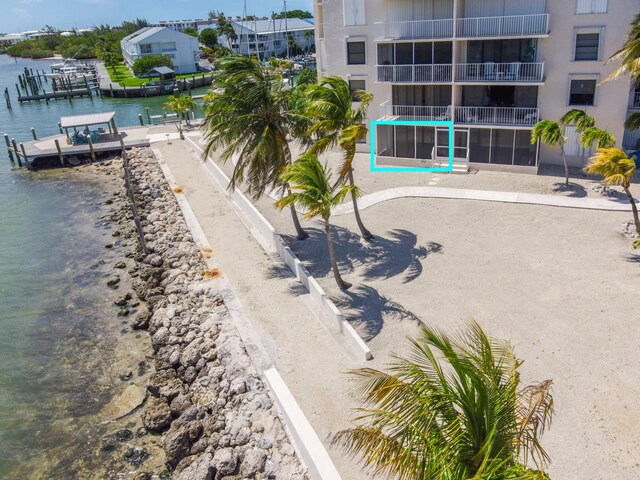 2000 Coco Plum Dr Unit 106, Marathon, FL 33050 - drone / aerial view of a nearby body of water and a pool
