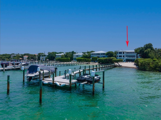 dock area featuring a water view