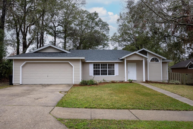 single story home with an attached garage, fence, driveway, roof with shingles, and a front yard