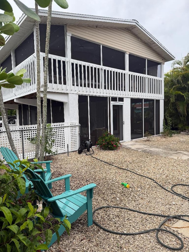 1672 Pandorea Ln, Big Pine, FL 33043 - back of house featuring a sunroom