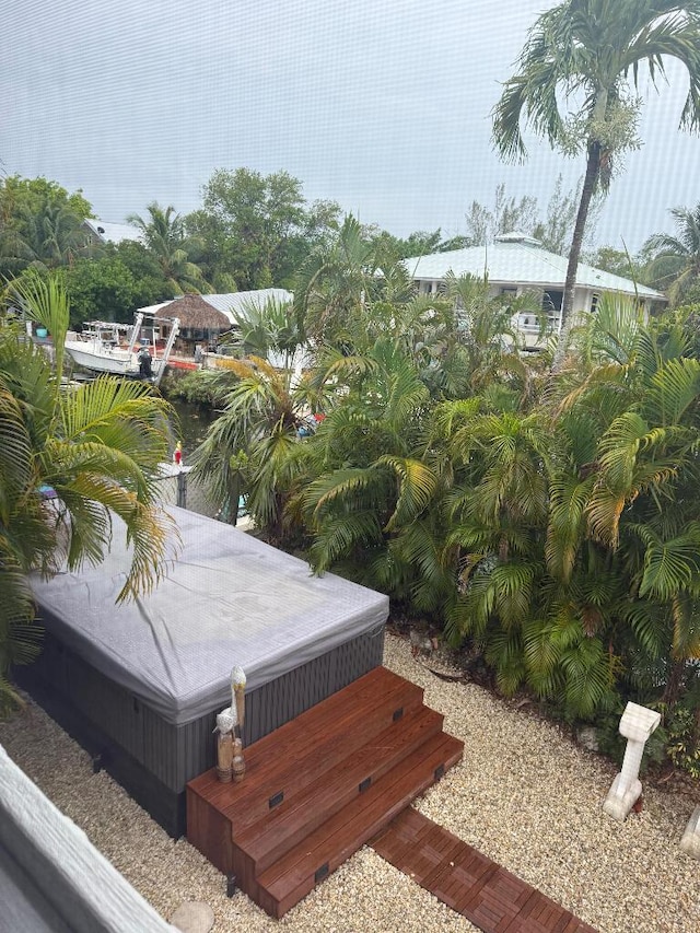 1672 Pandorea Ln, Big Pine, FL 33043 - wooden terrace featuring a hot tub