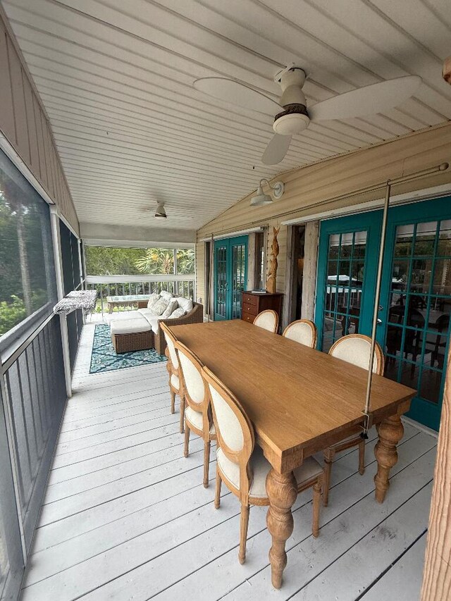 1672 Pandorea Ln, Big Pine, FL 33043 - wooden deck with french doors, ceiling fan, and outdoor lounge area