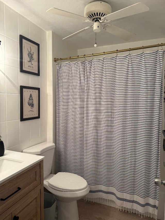 1672 Pandorea Ln, Big Pine, FL 33043 - full bath with vanity, tile walls, ceiling fan, and a shower with shower curtain