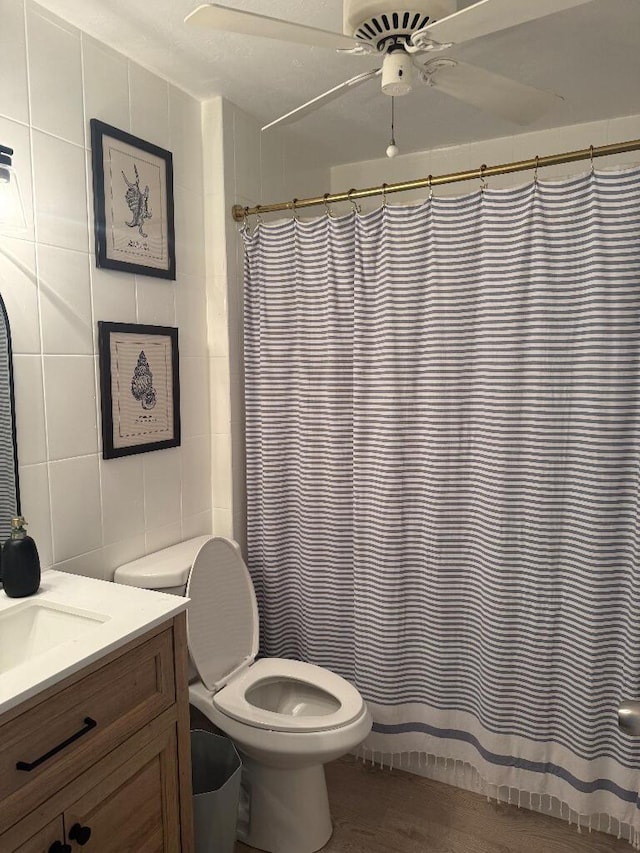 1672 Pandorea Ln, Big Pine, FL 33043 - full bath featuring vanity, tile walls, a ceiling fan, and curtained shower