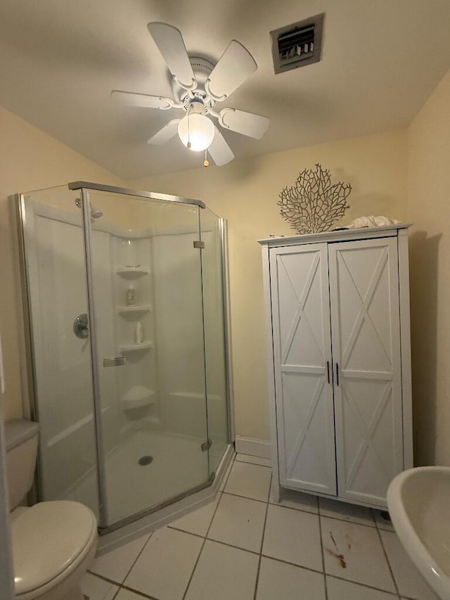 1672 Pandorea Ln, Big Pine, FL 33043 - full bath featuring a shower stall, a ceiling fan, and tile patterned flooring