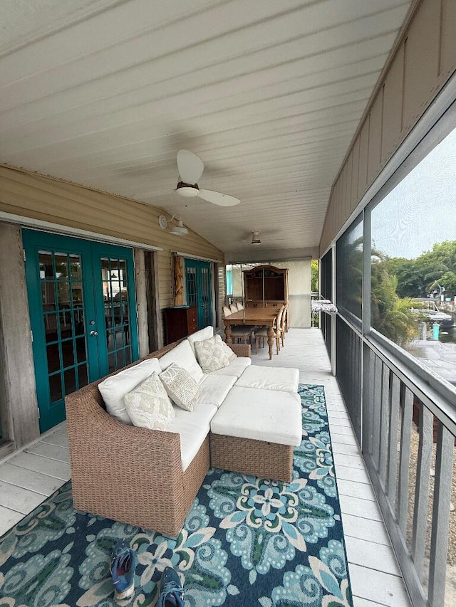 1672 Pandorea Ln, Big Pine, FL 33043 - sunroom / solarium with french doors, vaulted ceiling, an outdoor hangout area, and ceiling fan