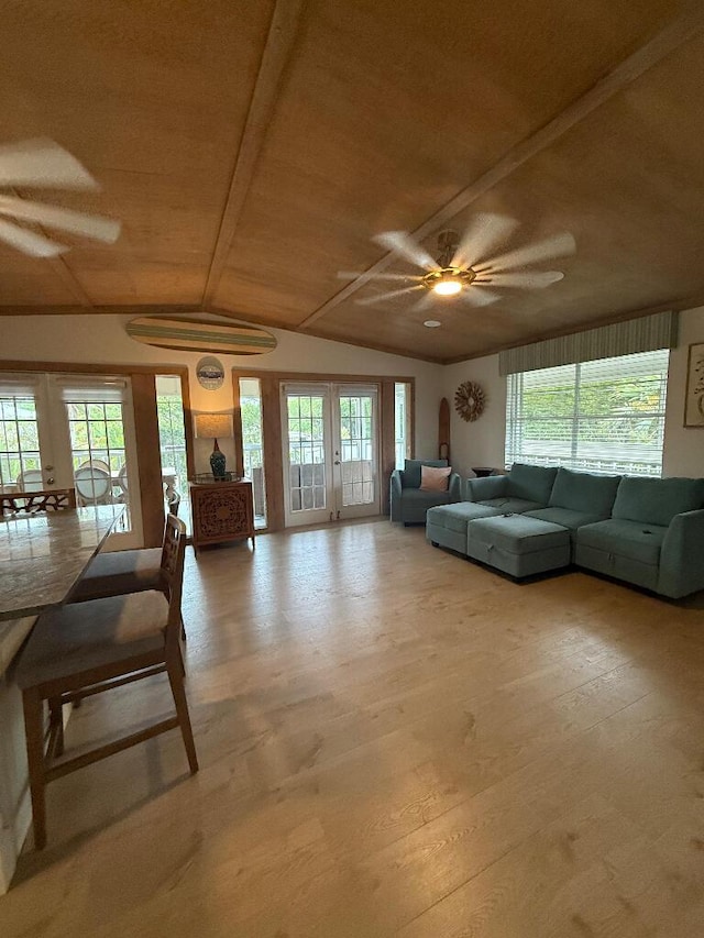 1672 Pandorea Ln, Big Pine, FL 33043 - living area featuring a ceiling fan, lofted ceiling, wood ceiling, and wood finished floors