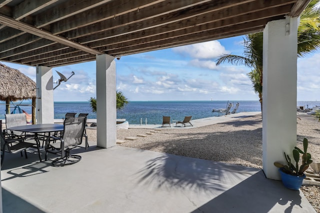 view of patio / terrace featuring a water view