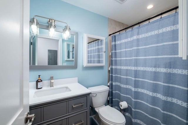 453 Lime Dr, Key Largo, FL 33037 - bathroom featuring vanity, toilet, and curtained shower